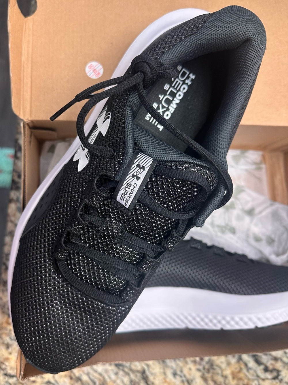 Under Armour women’s Black Athletic Sneakers with White Sole